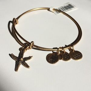 New gold Alex & Ani charm bracelet